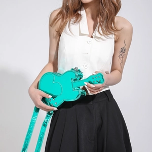 Unique mint green violin-shaped crossbody bag with metallic glossy finish for women