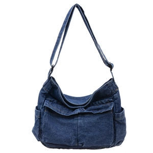 Kids denim crossbody bag in dark blue wash with contrast stitching and adjustable strap