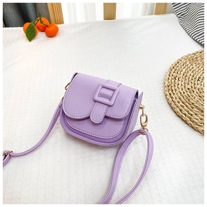 Detailed macro view of light purple lychee grain PU leather with stylish ring buckle decoration