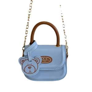Cute light blue mini handbag for girls featuring bear charm and gold chain strap