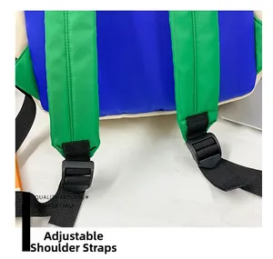 Close-up of adjustable shoulder straps on a colorful canvas kids backpack