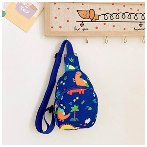 Detailed view of kids dinosaur chest bag with navy blue fabric and adjustable strap