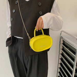 Mini bright yellow chain crossbody bag with textured leather and fashion lettering