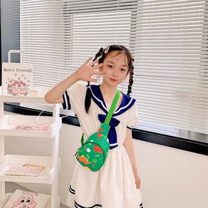 Cute green dinosaur crossbody bag for girls with cartoon patterns and adjustable strap