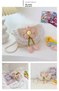Detail of girls' beige straw crossbody bag with lace trim and large pink flower