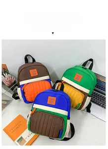 Detailed view of color-block canvas kids' backpacks with Happy Rabbit logo embroidery