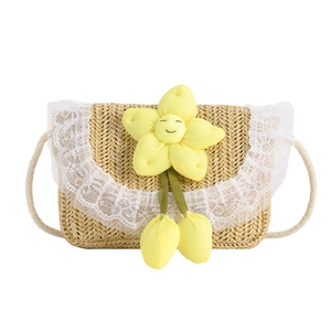 Cute kids woven straw crossbody bag with white lace trim and yellow flower charm