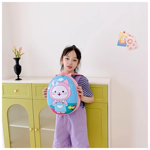 Close-up of lightweight toddler shell backpack with cartoon cat and padded straps