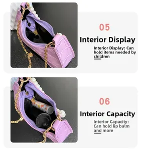 Detail view of purple crocodile texture mini bag with pearl handle and interior storage