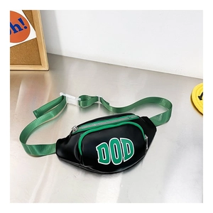 Detail of trendy color-block kids fanny pack with DOD lettering and green nylon strap