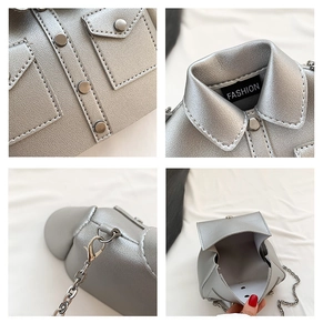 Detail shots of silver metallic shirt-shaped mini bag with collar and chain strap