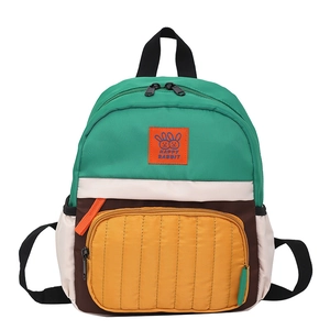 Colorful patchwork canvas backpack for toddlers featuring Happy Rabbit logo and front pocket