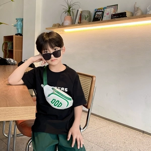 Stylish white children's waist bag with green zipper and DOD print on black t-shirt
