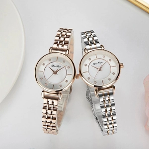 Classic waterproof women's quartz watches in rose gold and silver bicolor metal finishes