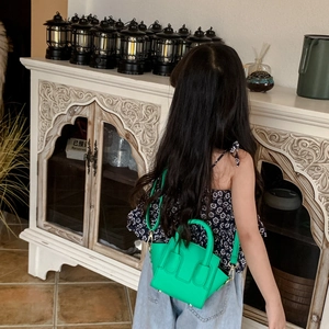 Mini green crossbody basket bag for girls with top handle and detachable strap
