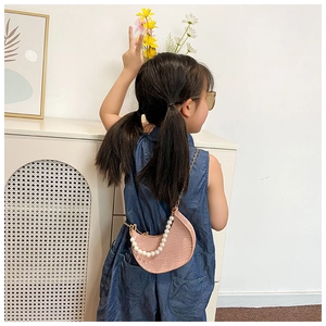 Pink faux crocodile leather mini bag for kids with pearl handle and gold chain