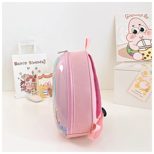 Close-up of pink kid backpack with ergonomic breathable mesh and purple hard shell cover