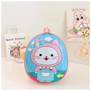 Detail of cute sky blue egg-shaped kids backpack with cartoon cat and pink handle