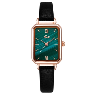 Gedi rose gold watch with green malachite texture dial and black leather strap