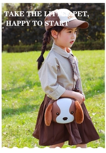 Close-up of cute cartoon dog crossbody bag with 3D plush ears on a little girl