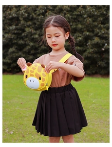 Detailed view of an adjustable strap on a cute yellow giraffe cartoon kids crossbody bag
