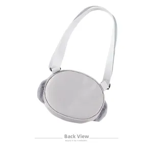 Back view of a cute round gray kids crossbody bag with soft plush trim and white strap