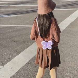 Girl's purple butterfly silicone crossbody bag with colorful adjustable strap on toddler