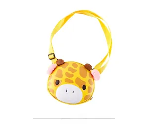 Front view of yellow cartoon giraffe crossbody bag for kids with adjustable strap