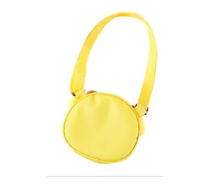 Rear view of vibrant yellow canvas crossbody bag for kids with adjustable shoulder strap