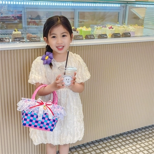 Pink and blue woven girls handbag with white lace trim and strawberry ribbon charm