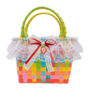 Colorful woven beach tote for girls with lace trim and strawberry pendant detail