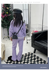Detail view of girls lilac purple lounge set with white knit trim and crossbody bag accessory
