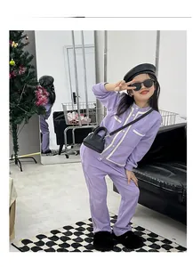 Fashionable purple girls knitwear set with wavy trim detail and mini crossbody bag