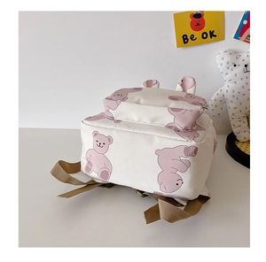 Detail of canvas kids backpack with 3D bear ears and cute cartoon animal print