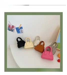 Detailed display of mini shell-shaped PU leather coin purses in six various pastel colors