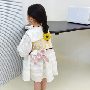Girl's white ruffle dress and tweed vest set with a pearl handle floral handbag