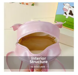 Vue intérieure d'un sac à dos rose en cuir PU pour filles avec fermeture à glissière
