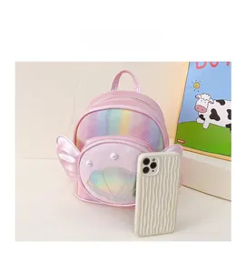 Sac à dos pailleté rose pour enfant avec détail coquillage et comparaison de taille réelle