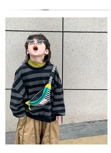 Kids casual street style with contrast striped chest bag and trendy letter strap