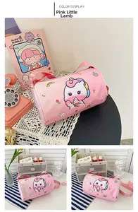 Detail view of the pink cylinder canvas bag with cute unicorn and rainbow prints