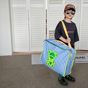 Kids blue plaid travel bag with green bear embroidery and yellow shoulder strap