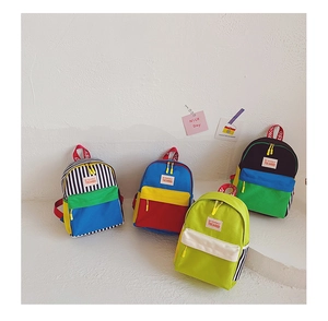 Collection of colorful canvas backpacks for toddlers with side mesh pockets and logos