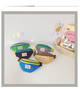 Detailed flat lay of canvas kids chest bags in various colors with Be Yourself logo