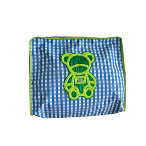 Blue plaid children's shoulder bag with cute green bear patch for travel and storage
