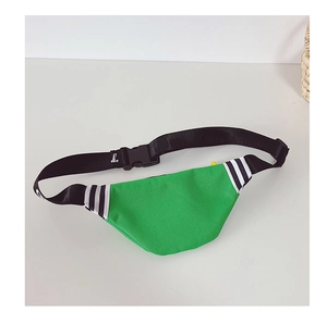 Detail of adjustable black nylon strap and buckle on neon green kids chest bag