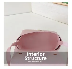 Internal structure of the pink PU leather crossbody bag featuring a secure magnetic snap