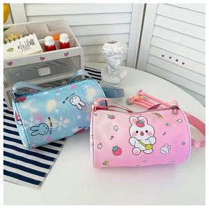 Close-up of cute cartoon rabbit print on pink and blue canvas cylinder bags for girls