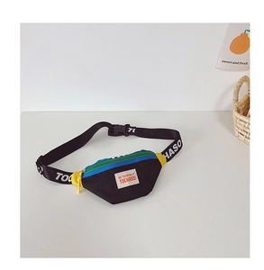 Detail view of children's color-block waist bag with blue and green zipper accents