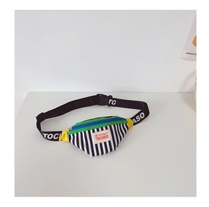 Detailed shot of kids canvas crossbody bag with striped pattern and colorful zip straps