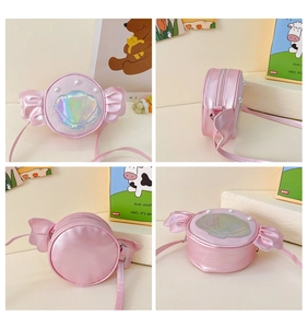 Detailed views of girls pink candy bag with laser shell pattern and pearl accents